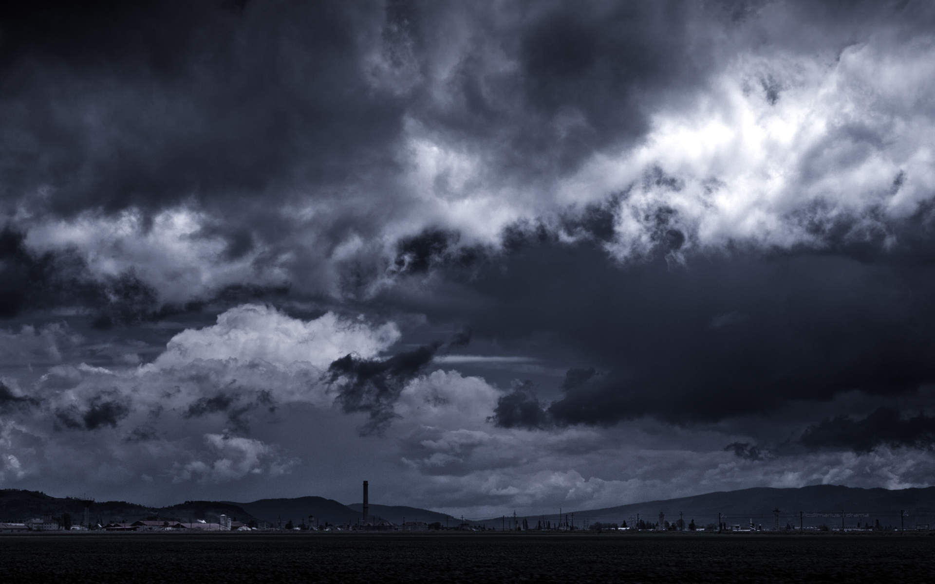 Storm Clouds Forming Over A Rural Village Wide Desktop Background Female Grappling