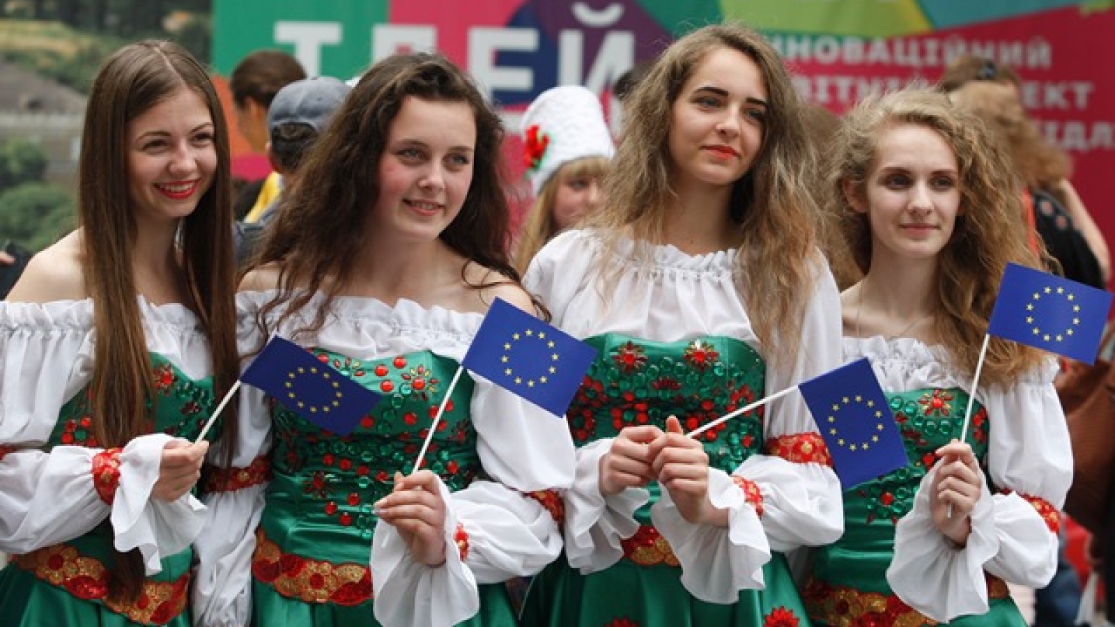 Young Women In Costumes With EU Flag UkraineEuropaDay013 Dww Ina And   Young Women In Costumes With EU Flag UkraineEuropaDay013 Dww Ina And Anna Ukraine Photo Via Aravot En.am  